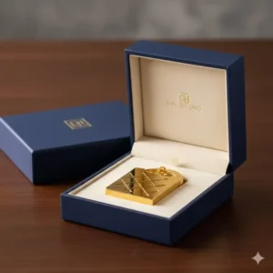 A beautiful gold keychain presented inside its luxury gift packaging, ready for gifting.