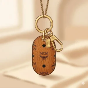 Close-up illustration of a classic mcm keychain in signature Visetos monogram print with detailed stitching.