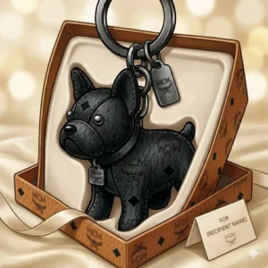 A collection of mcm keychain accessories in various colors including cognac, black, and navy blue.